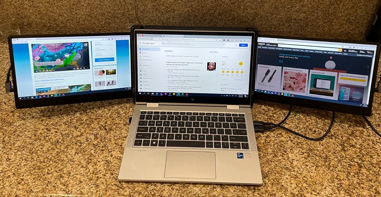 a reviewer's macbook with the dual screen extender