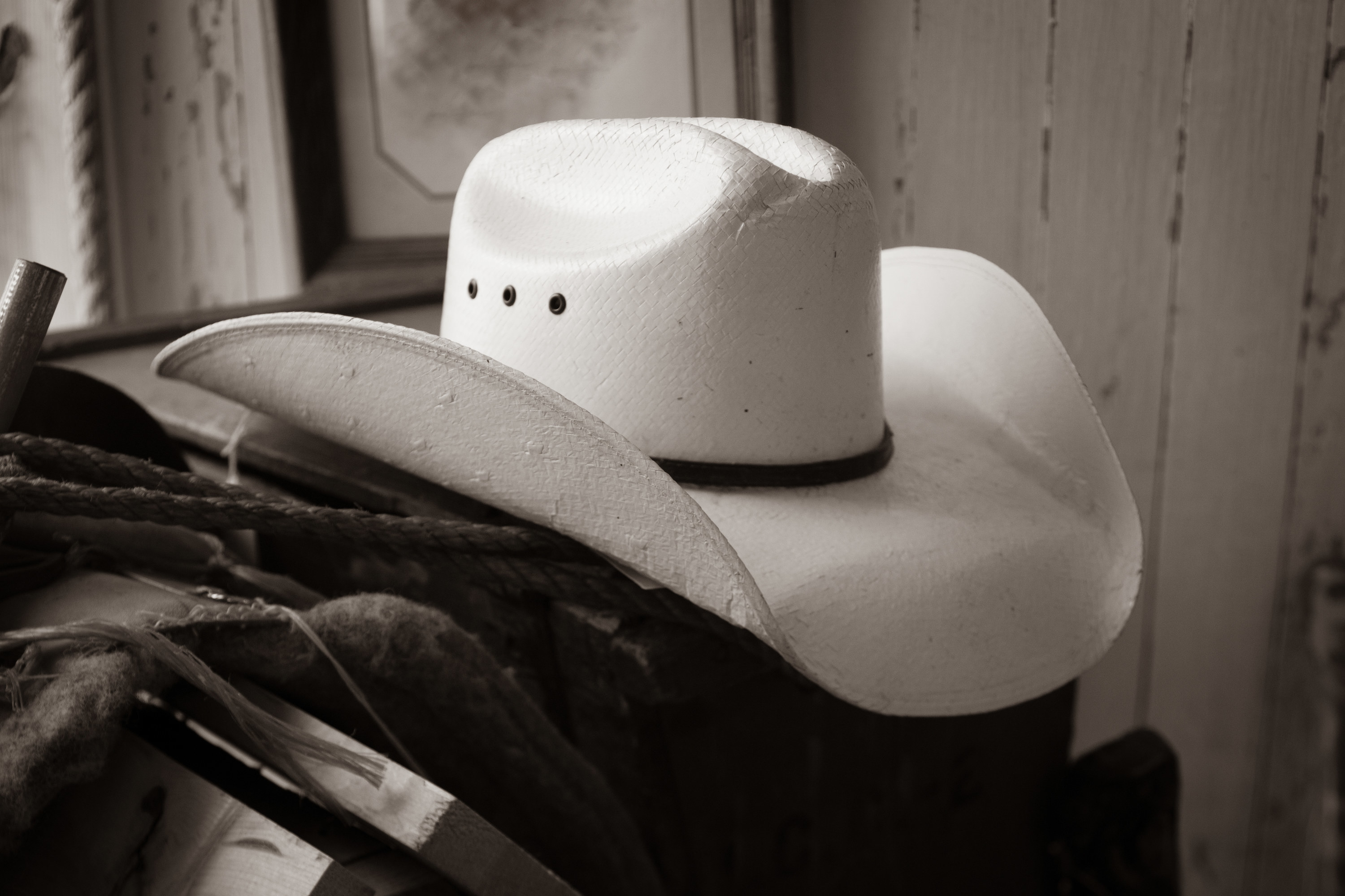 A white cowboy hat is pictured