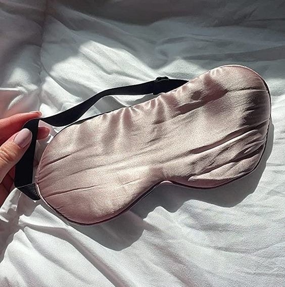 Reviewer image of pink silk sleep mask