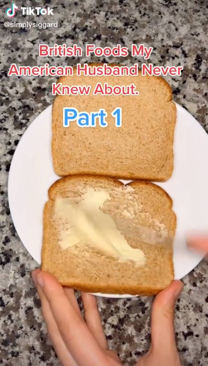 A screenshot from the TikTok of Caroline spreading butter on a piece of toast