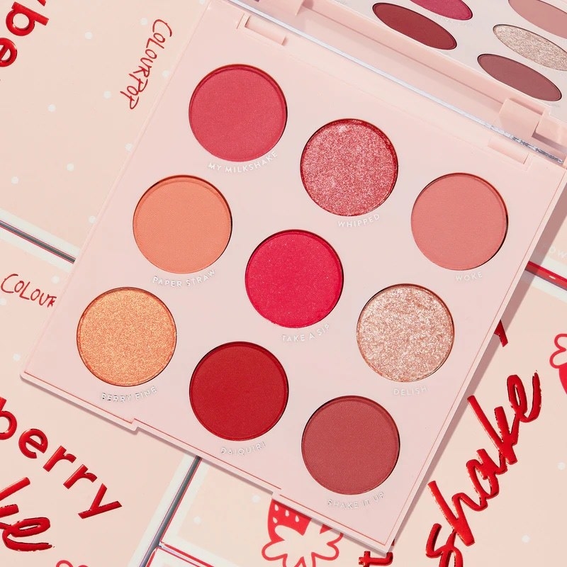 an eyeshadow palette with nine shades of pink