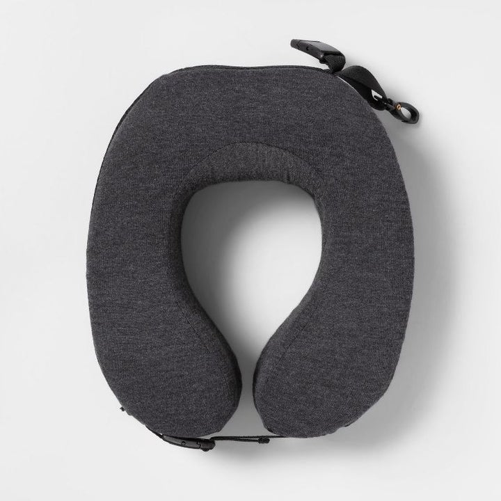 the gray u-shaped pillow