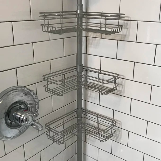A shower corner-caddy with four shelves