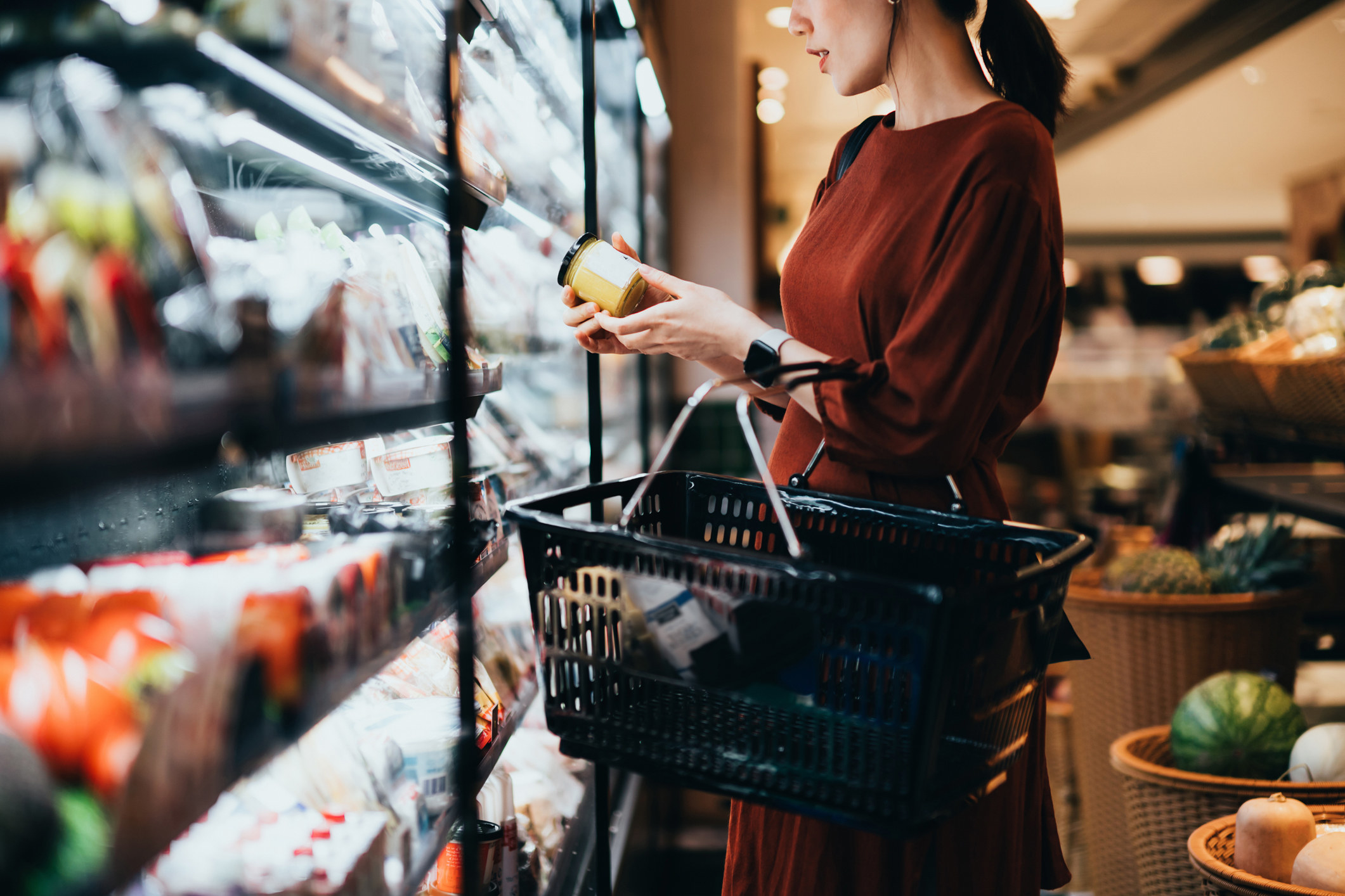 Person looking at product in grocery store