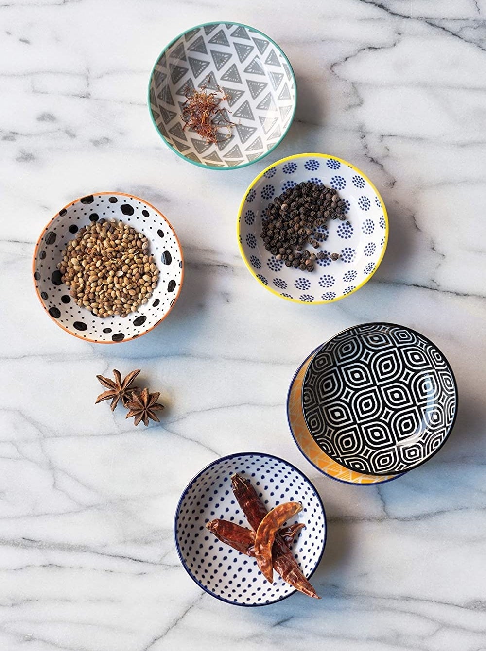 a flatlay of the pinch bowls, each with a different design
