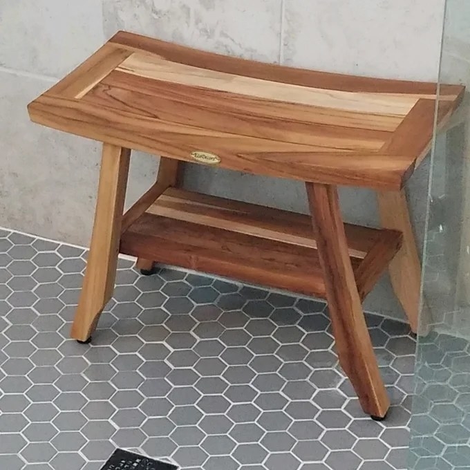 A wooden shower bench