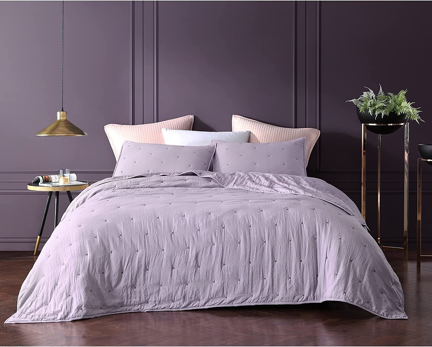 a soft microfibre bedspread arranged neatly on a bed