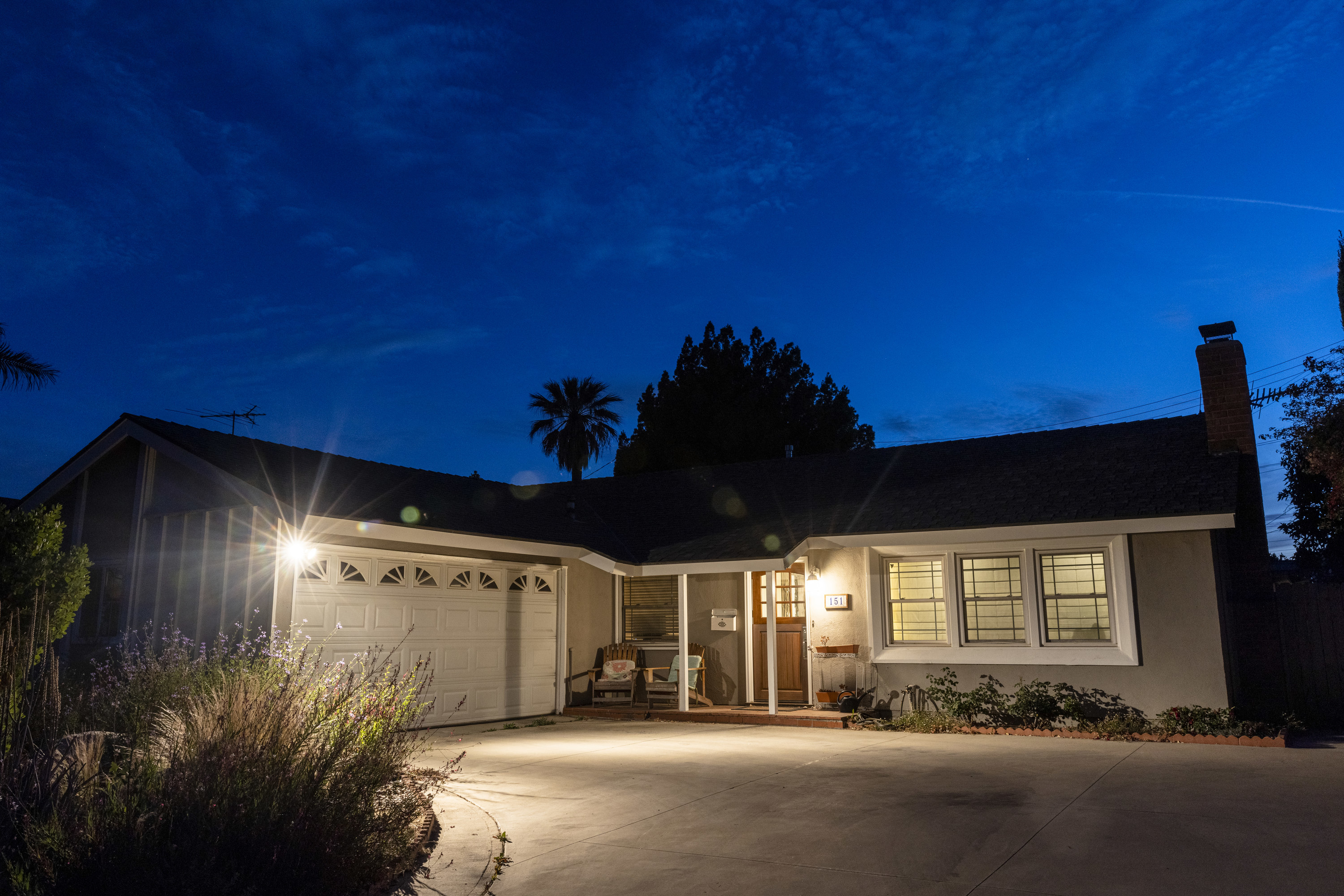 the outside of a dark house at night