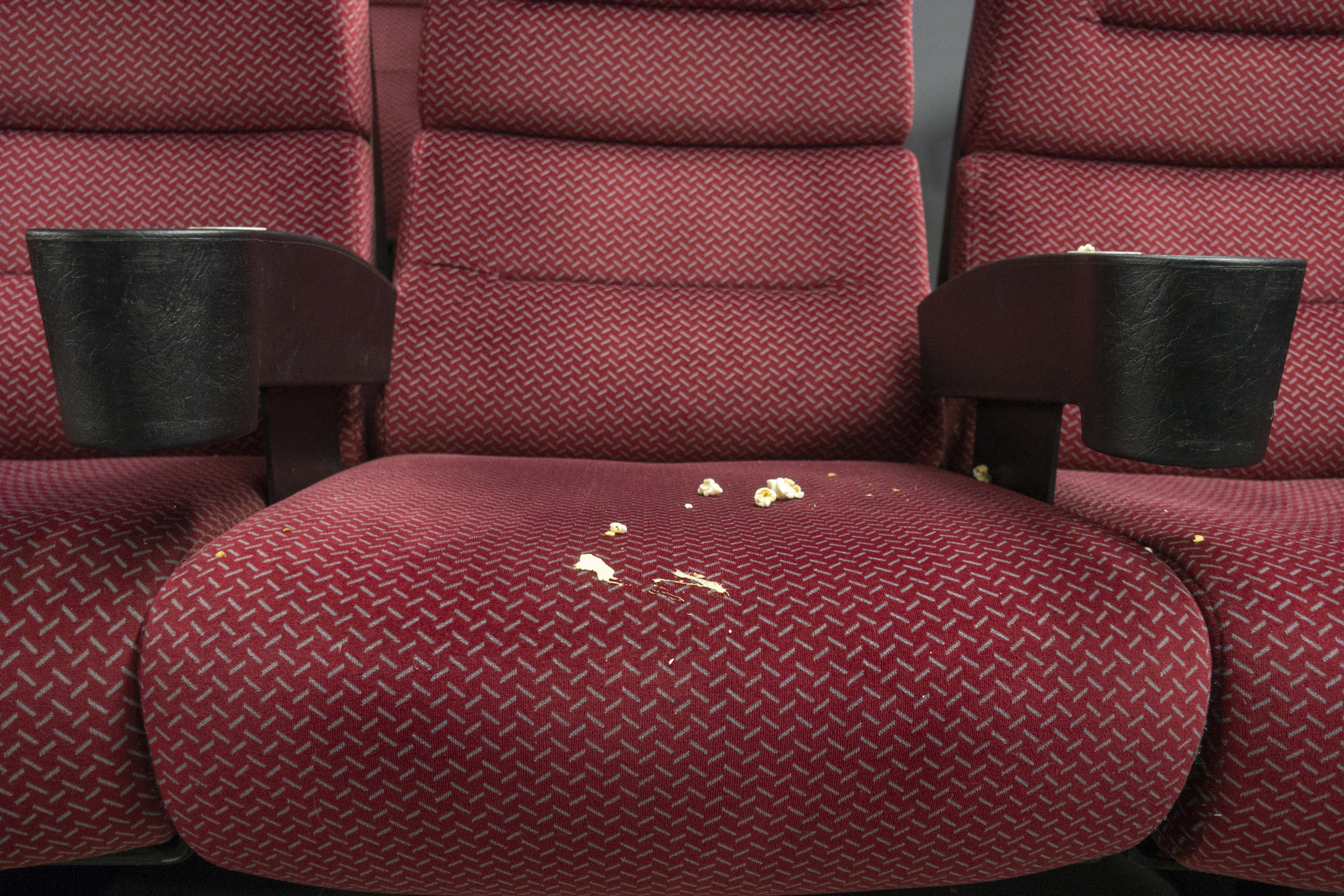 close up of a dirty theater seat