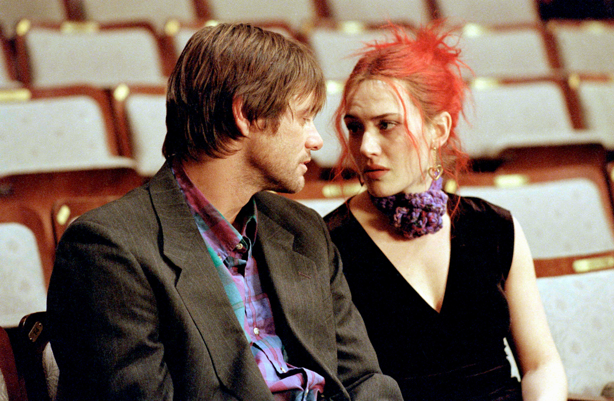 Jim Carrey and Kate Winslet sitting together.
