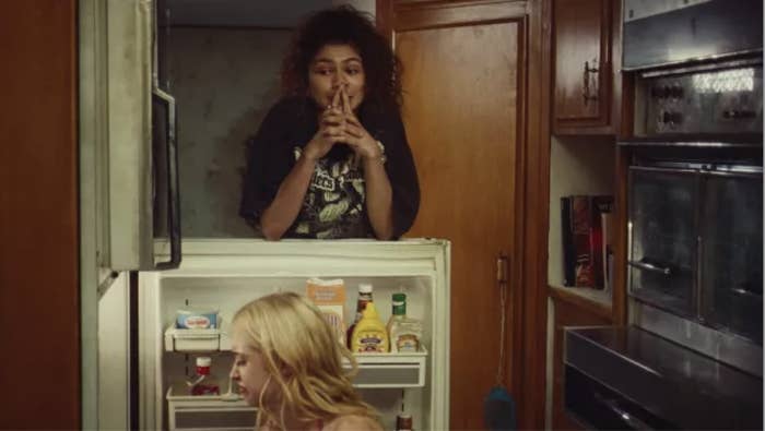 Zendaya in Euphoria standing over an open fridge door
