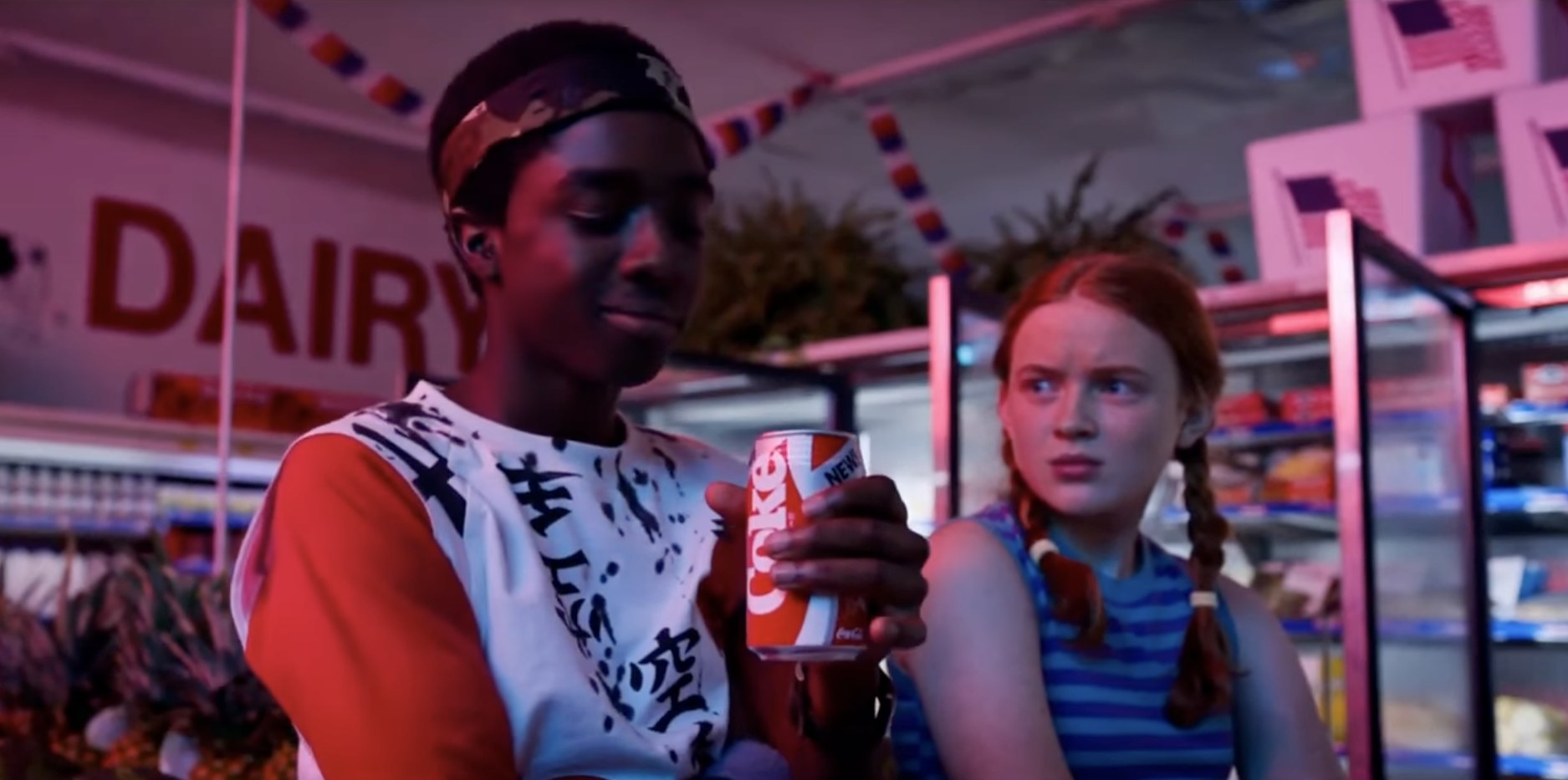 lucas with a can of new coke in stranger things