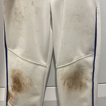 Reviewer's before photos showing their child's stained pants
