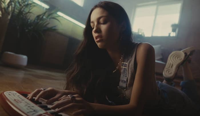 olivia playing a small keyboard