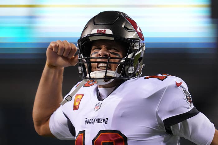 close up of tom in a football uniform and helmet