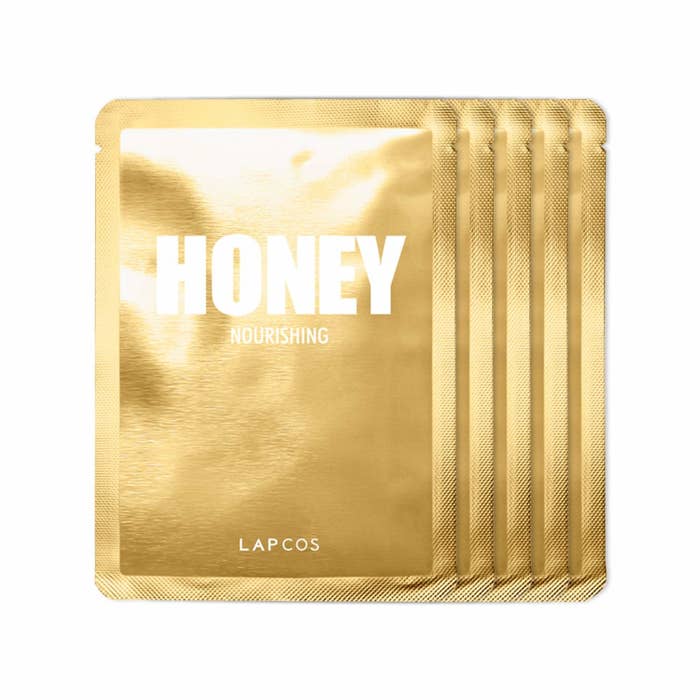 Five gold honey face mask packages