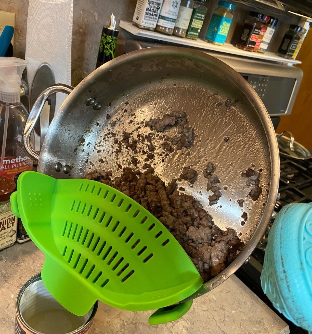 Reviewer image using strainer on a pan