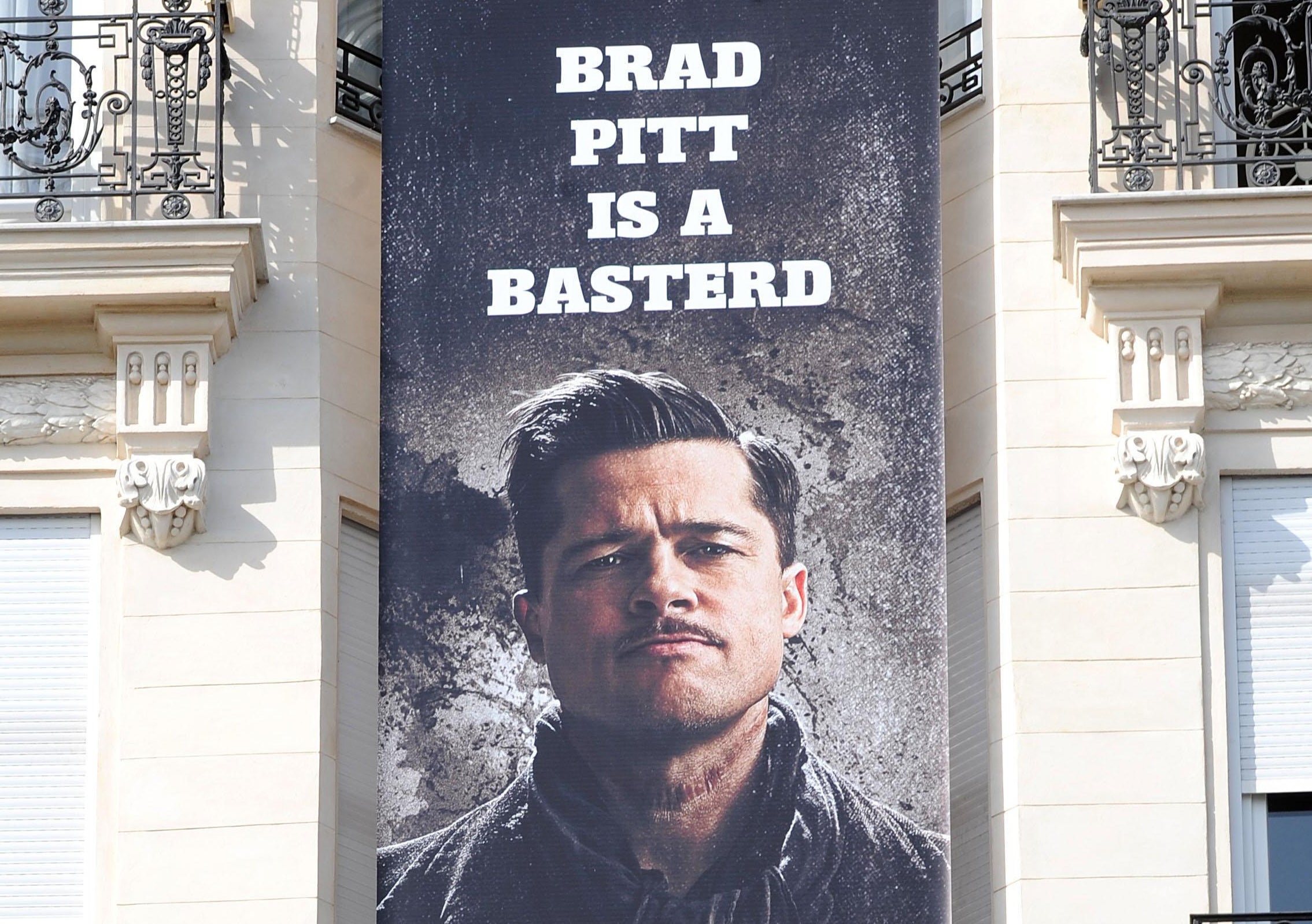 Promotional poster featuring Brad Pitt for Inglourious Basterds film