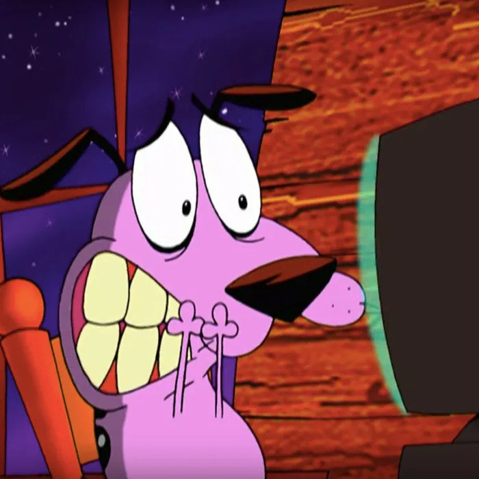 An animated figure of a purple-coloured dog looks scared and anxious