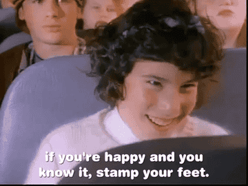 A gif of a person bopping their head and the text overlay says &quot;if you&#x27;re happy and you know it, stamp your feet&quot;