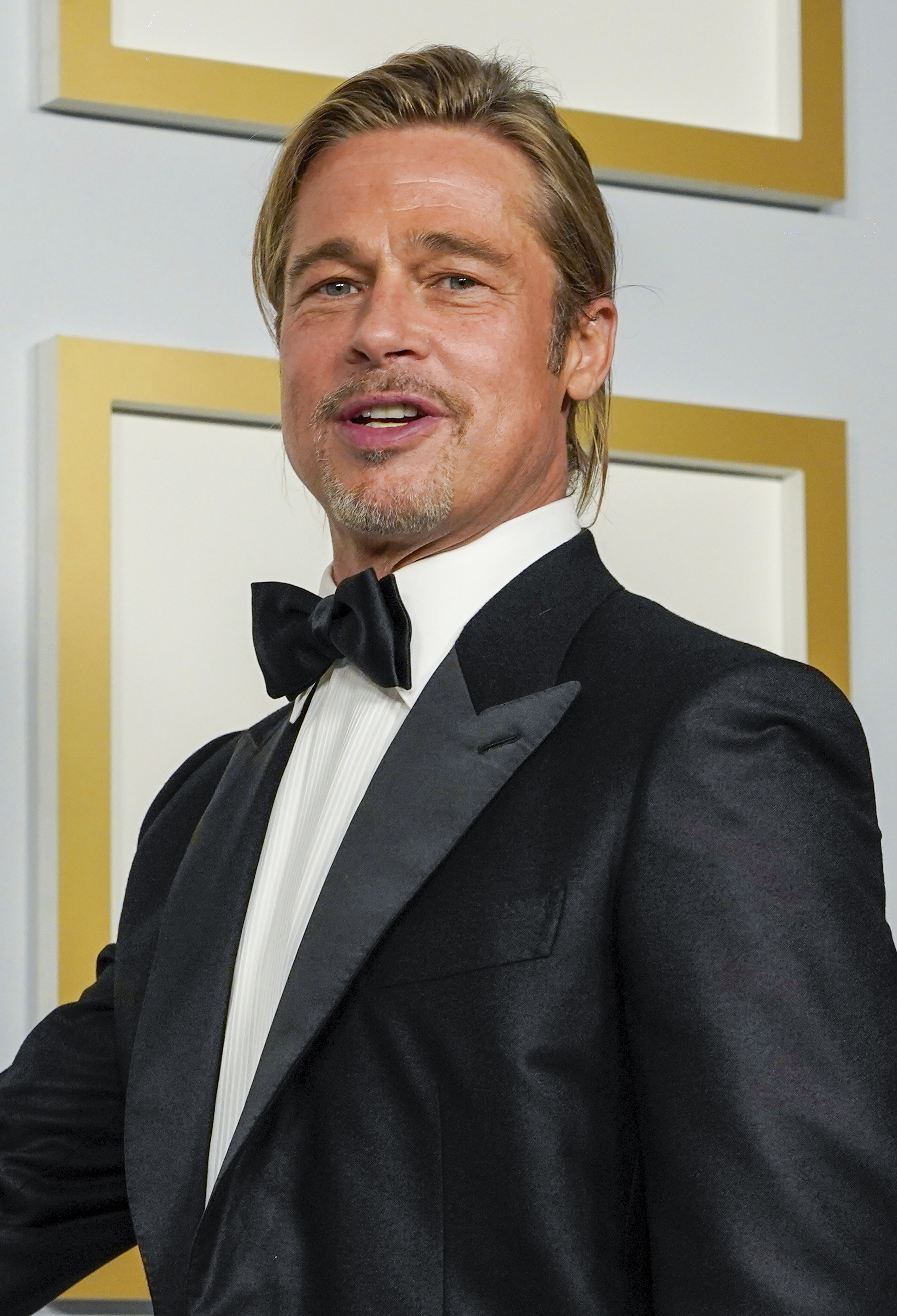 Brad Pitt poses in the press room at the Oscars on Sunday, April 25, 2021, at Union Station in Los Angeles