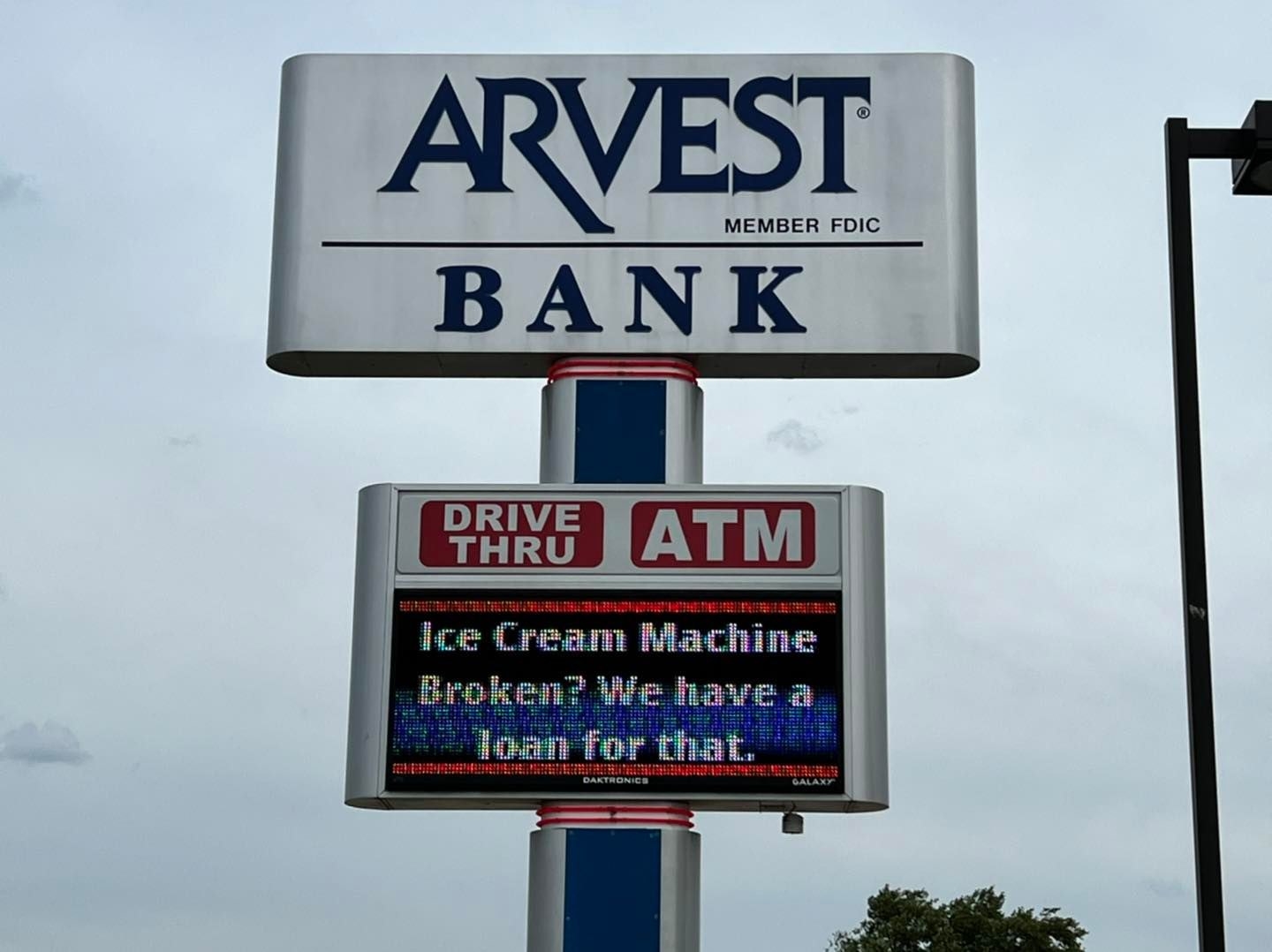 Arvest Bank's sign says "Ice cream machine broken? We have a loan for that"