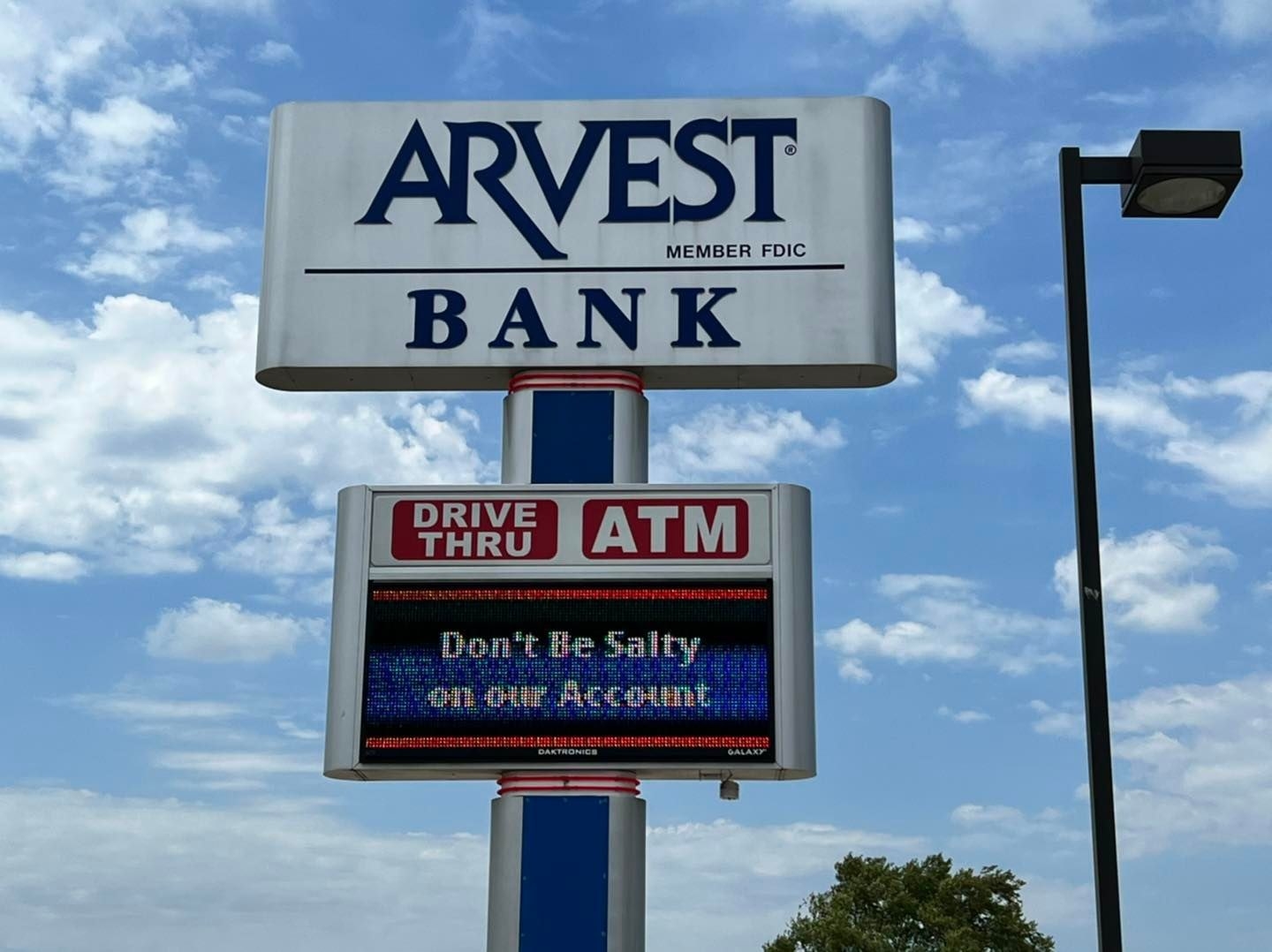 The sign outside an Arvest Bank says "Don't be salty on our account"