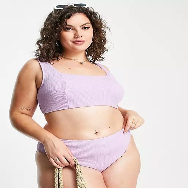 model wearing a matching lilac bikini set