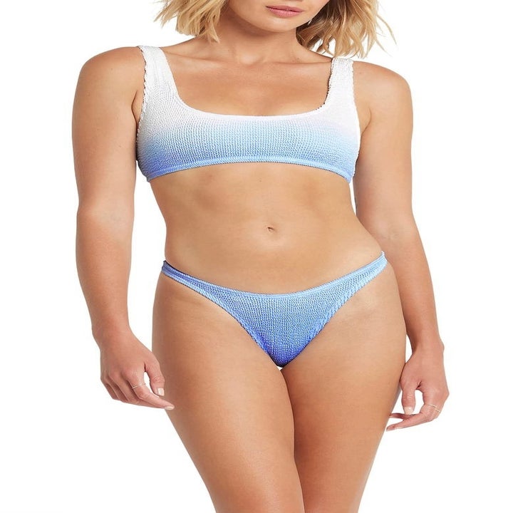 model wearing a matching blue ombre bikini