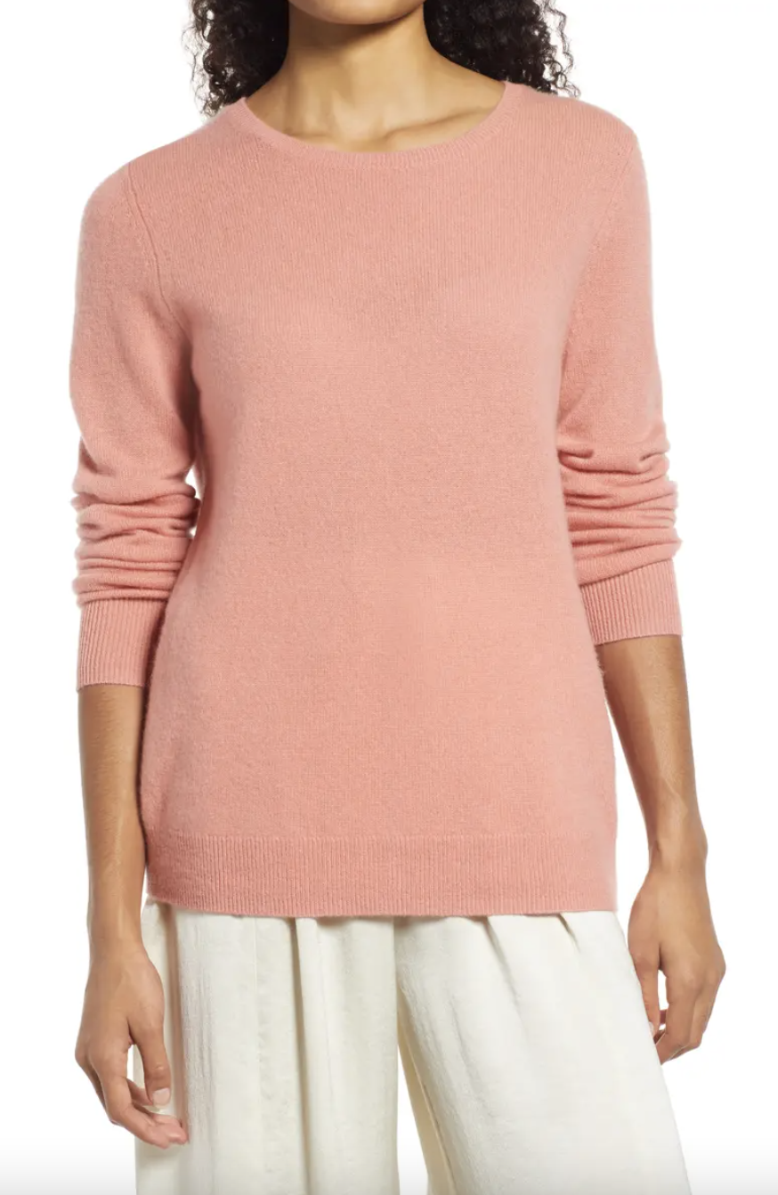 a person wearing the cashmere crewneck sweater