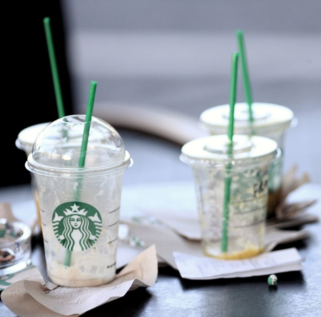 used Starbucks cups, napkins, and receipts