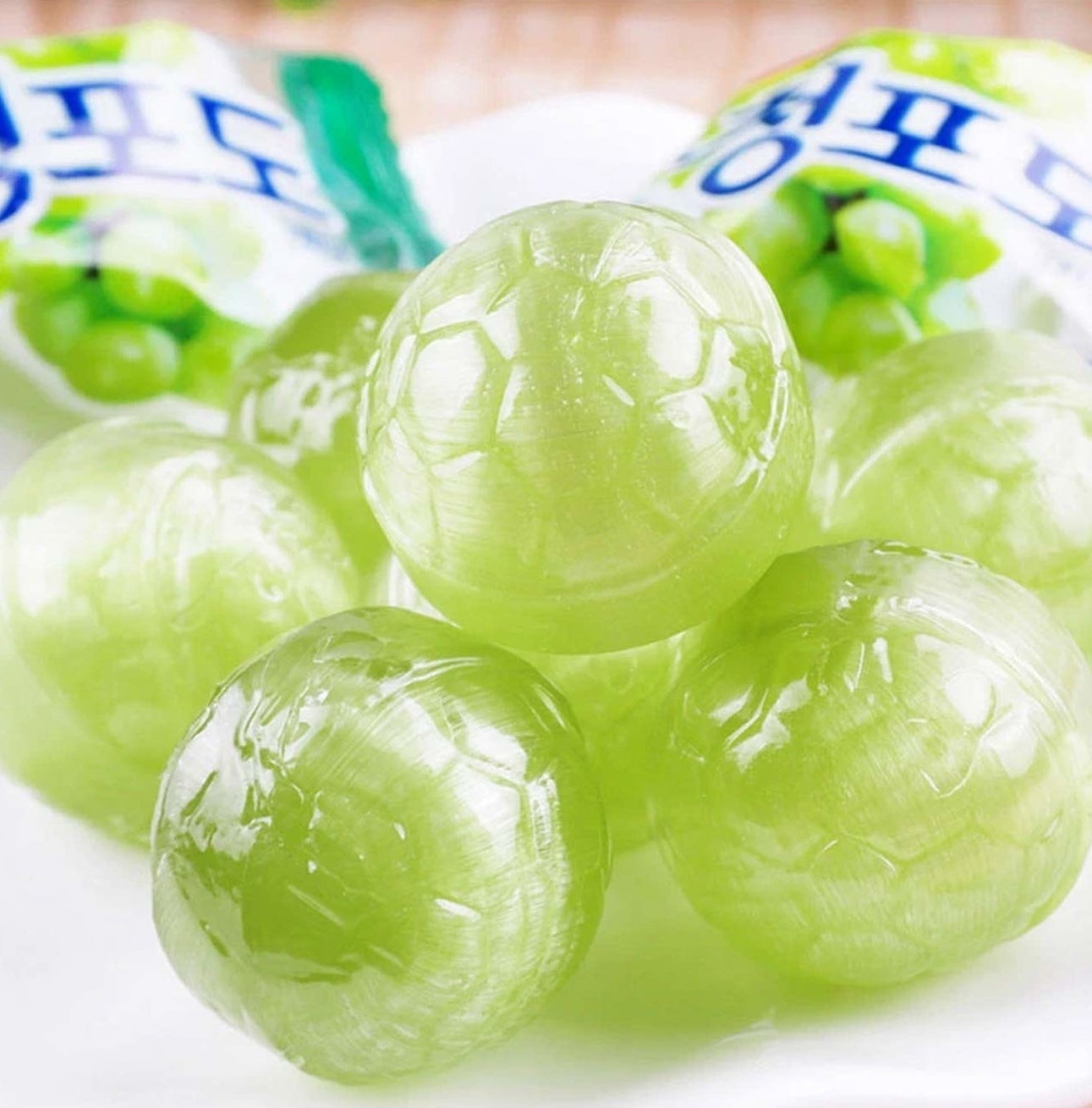 several light green hard grape candies