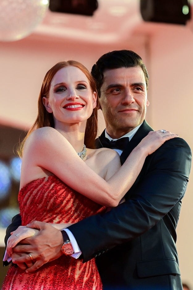 Jessica Chastain and Oscar Isaac pose at the &quot;Scenes from a Marriage&quot; screening on September 4, 2021 at the Venice Film Festival