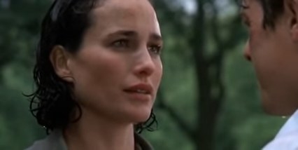 Carrie talking to Charles in the rain in
