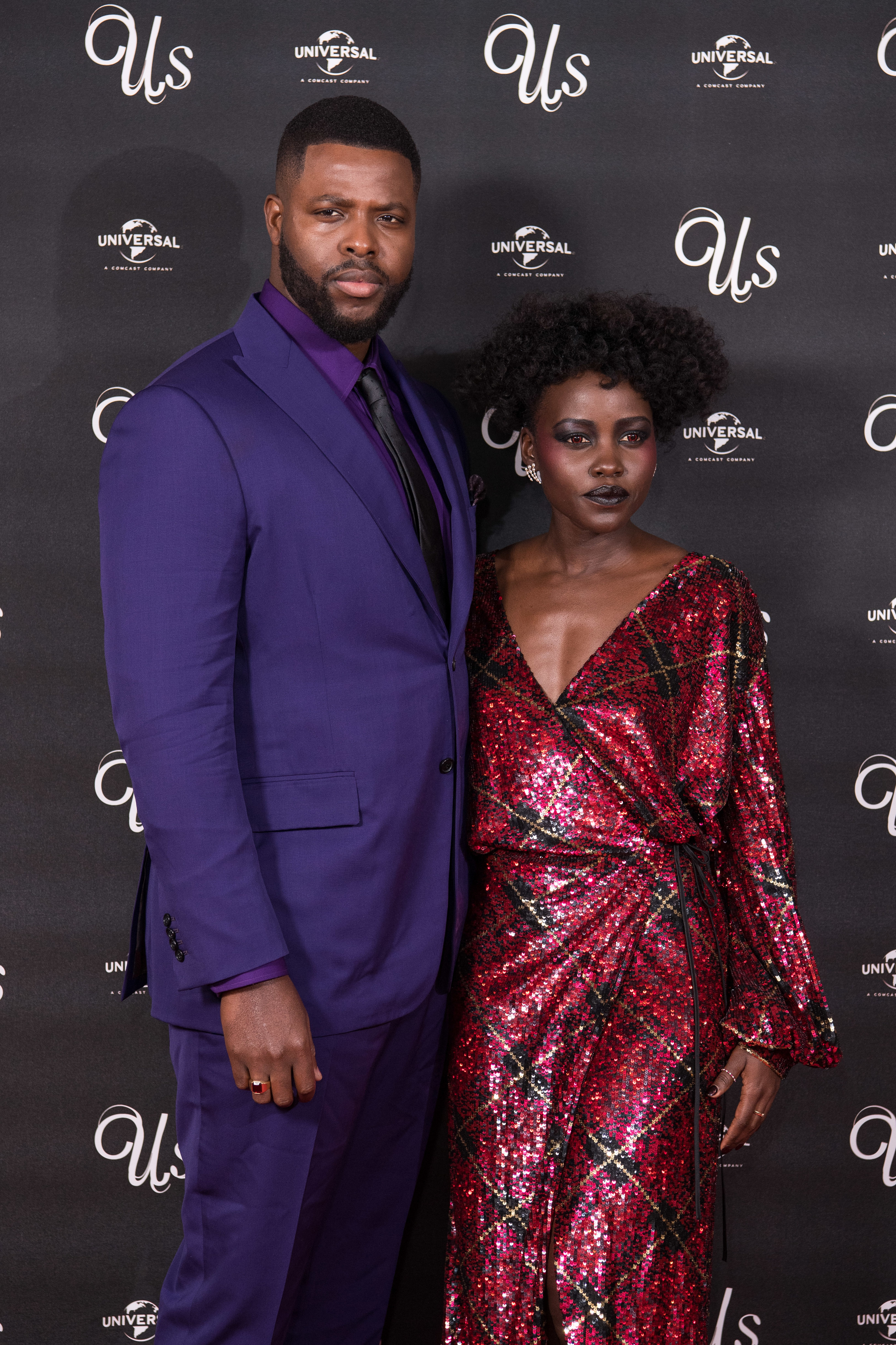 Winston Duke and Lupita Nyong&#x27;o poses at a 2019 &quot;Us&quot; screening in London, England