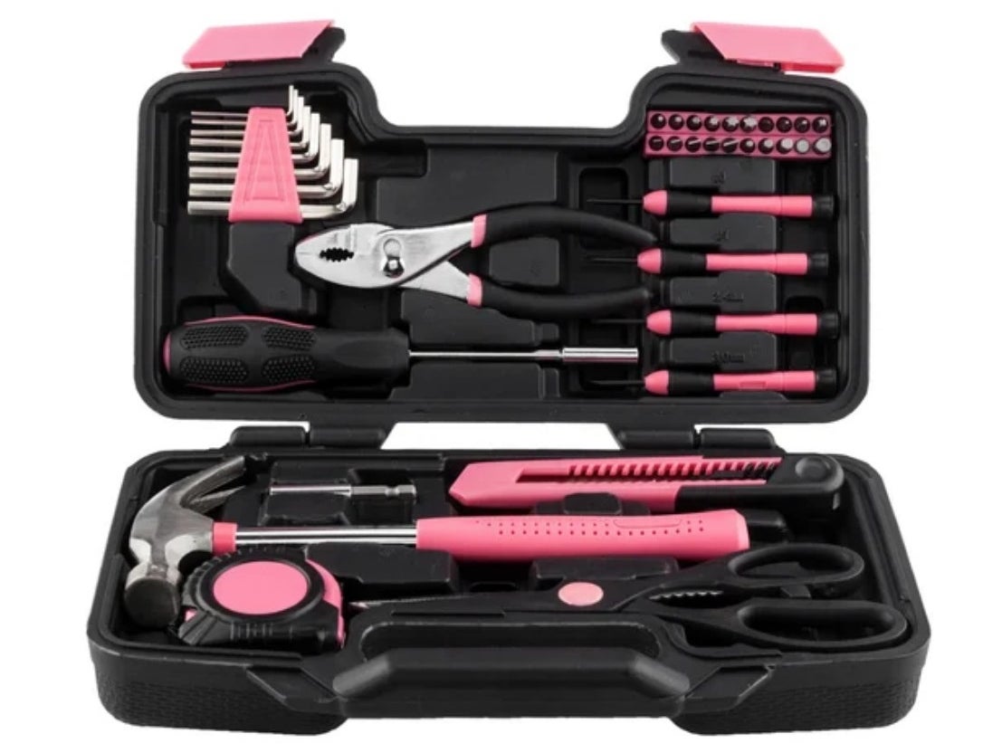 Black tool box with pink and black tools