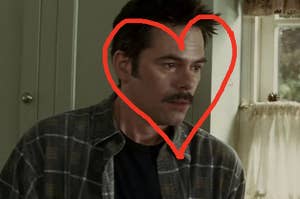 A close up of Charlie Swan with a heart drawn around his face