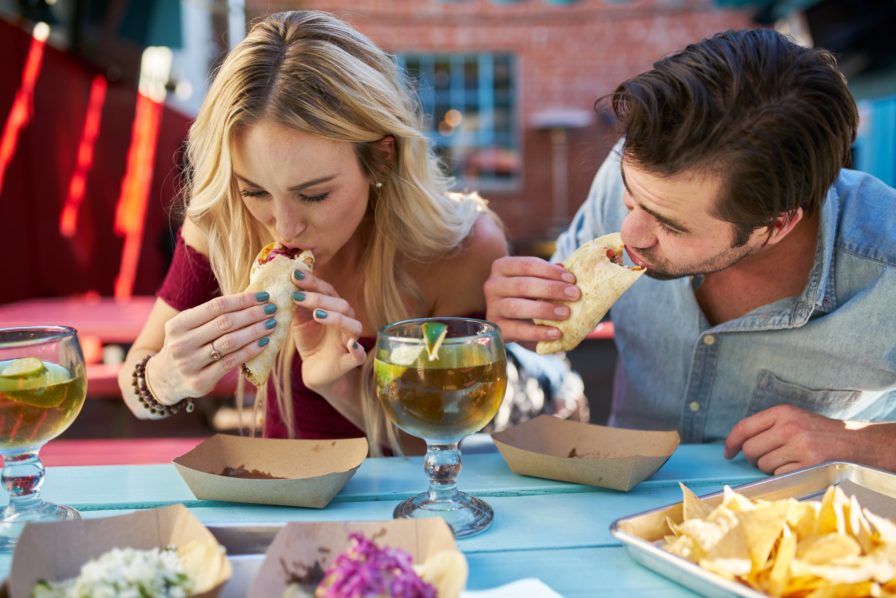 couple eating food at a mexican restaurant