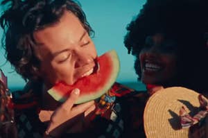 harry styles being fed watermelon
