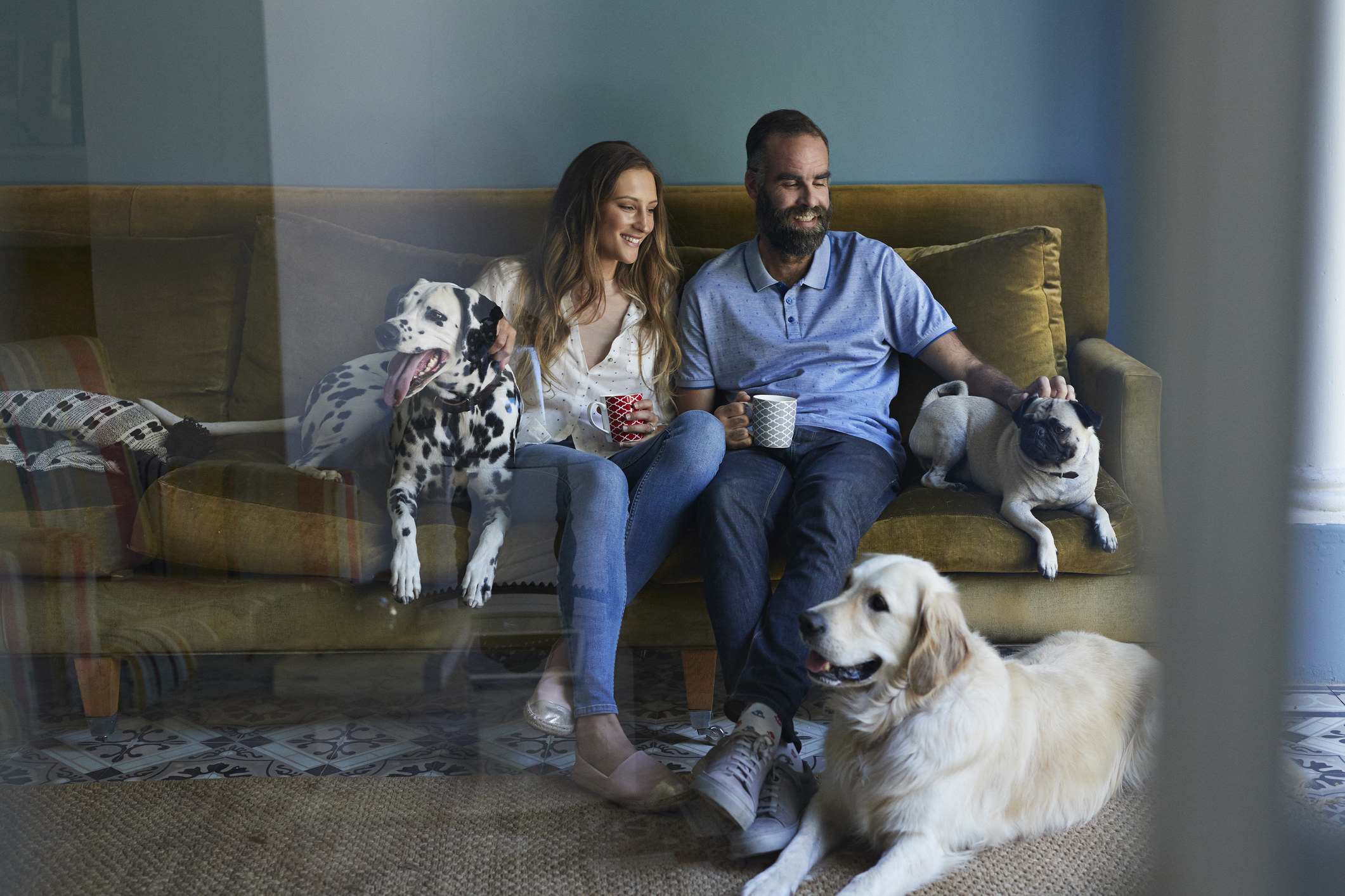 couple with their three dogs