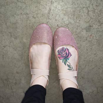 reviewer wearing same ballet flats in a shimmery champagne pink shade