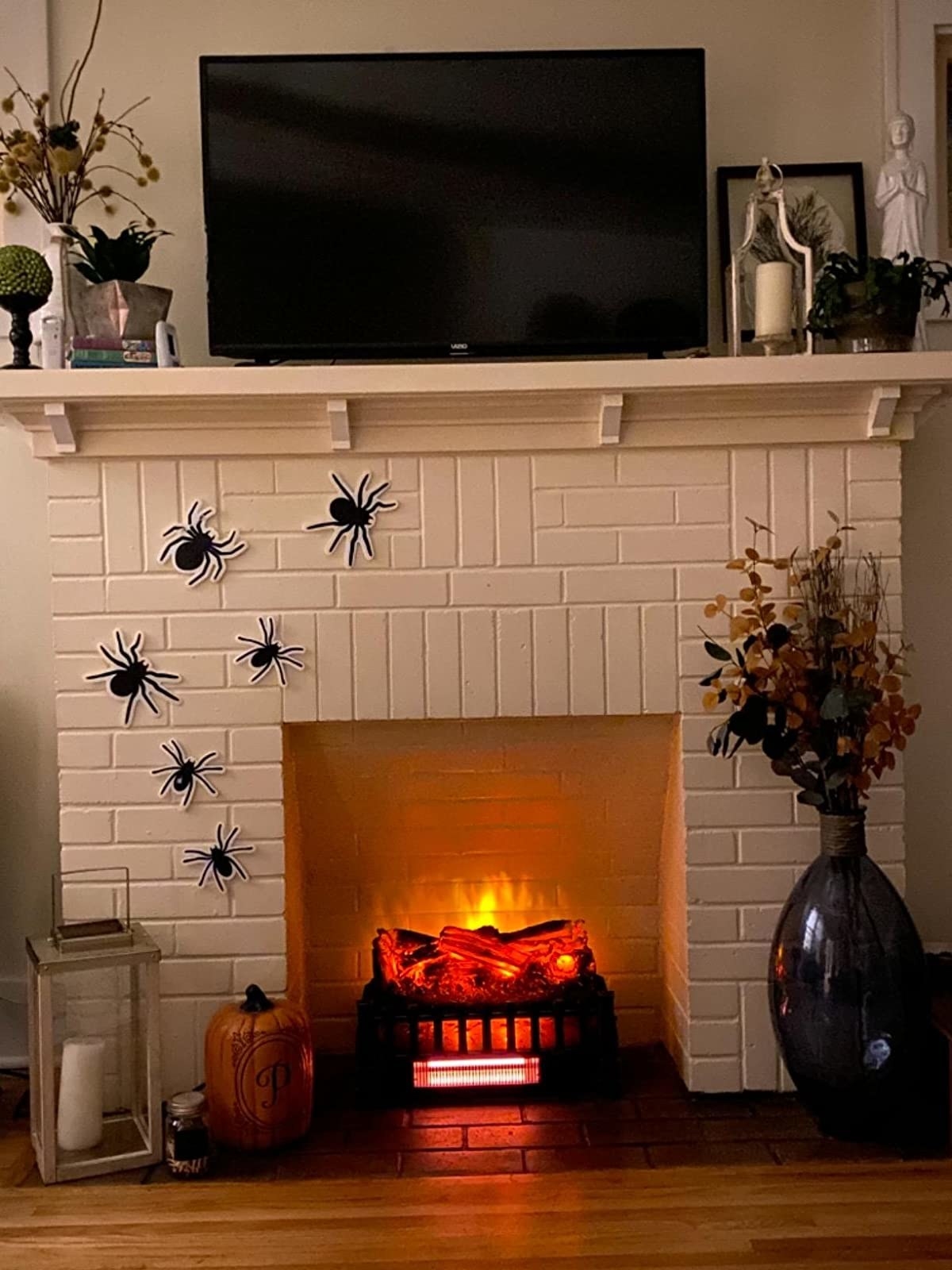 reviewer with the logs in their fireplace