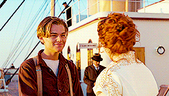 Leonardo DiCaprio and Kate Winslet as Jack and Rose shake hands in &quot;Titanic&quot;