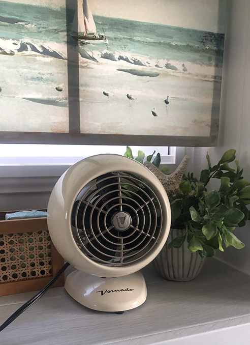 reviewer image of small round fan on a windowsill