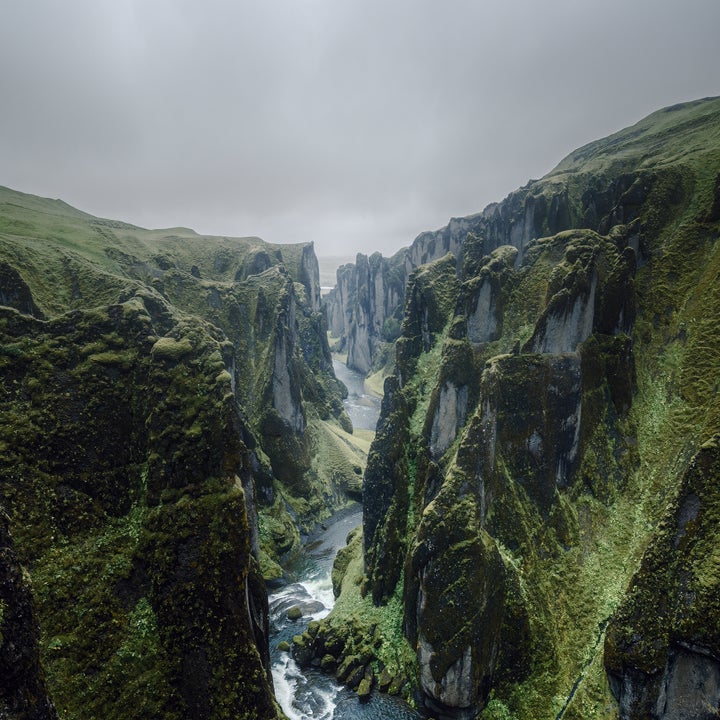 Water cutting through the Fjaðrárgljúfur canyon