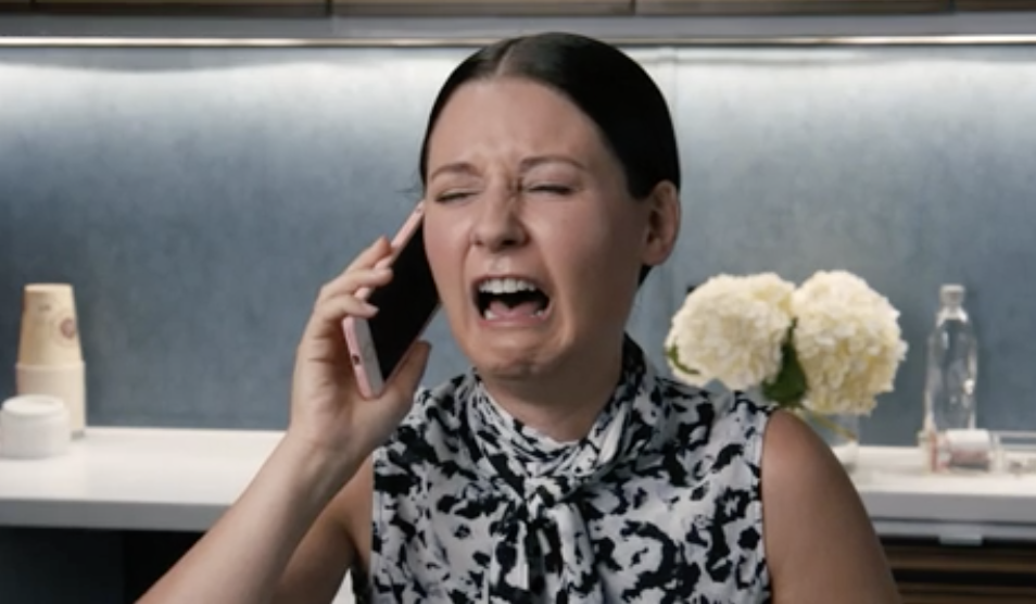 A woman crying on the phone
