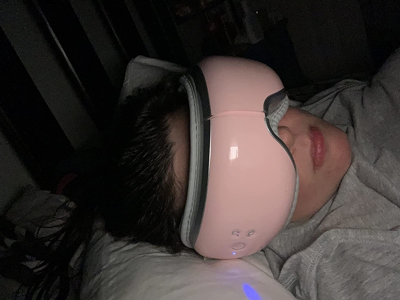 a reviewer wearing the pink mask
