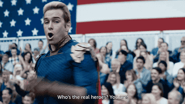 Antony Starr as Homelander shouting to a crowd Whos the real heroes You are