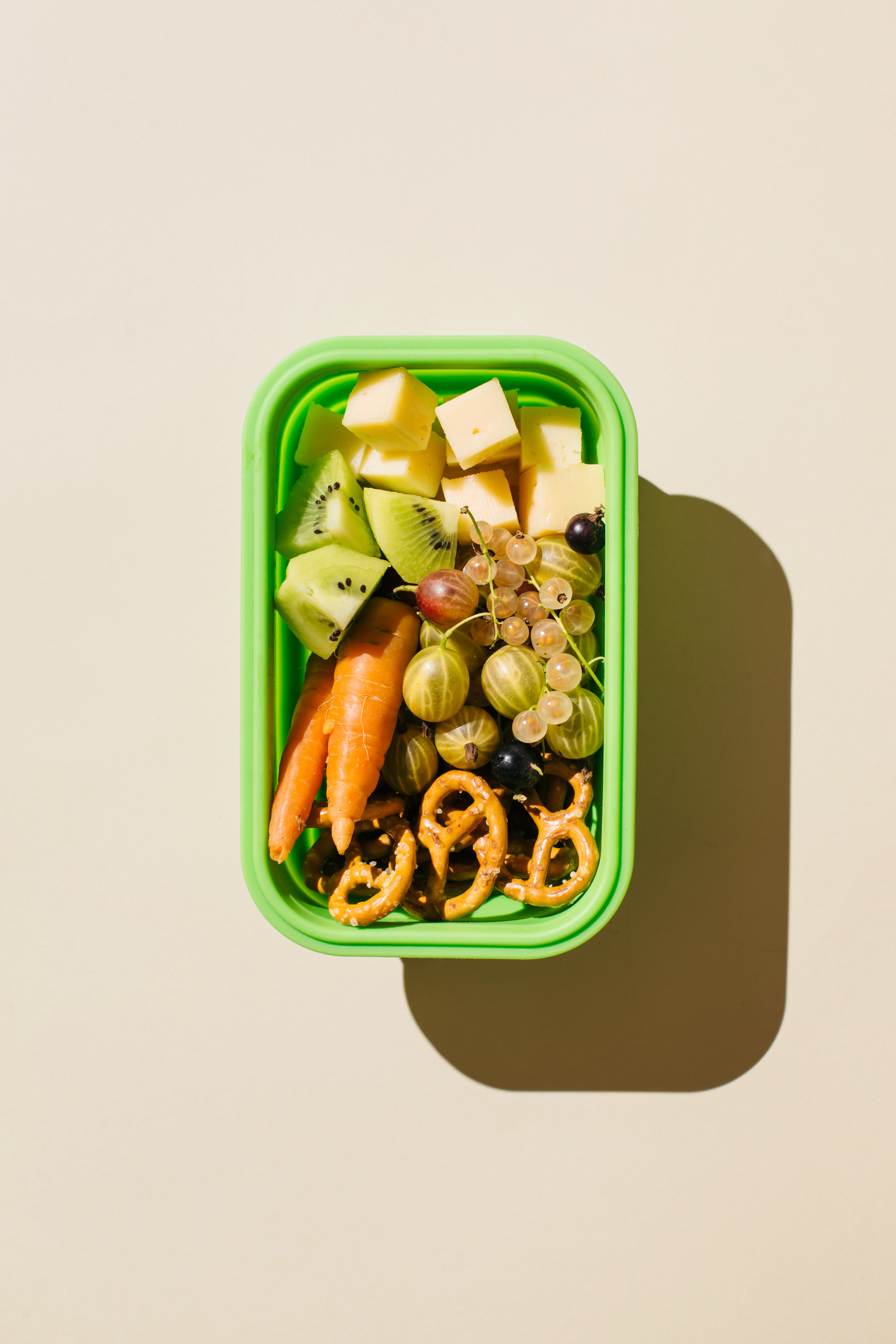 a rubber container holding snacks