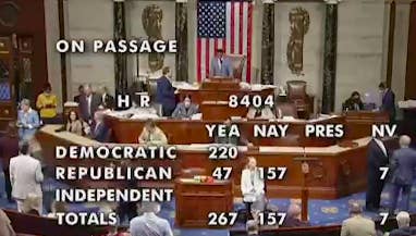 A TV graphic shows all 220 Democrats voted yes on the bill, while 47 Republicans voted yes and 157 Republicans voted no